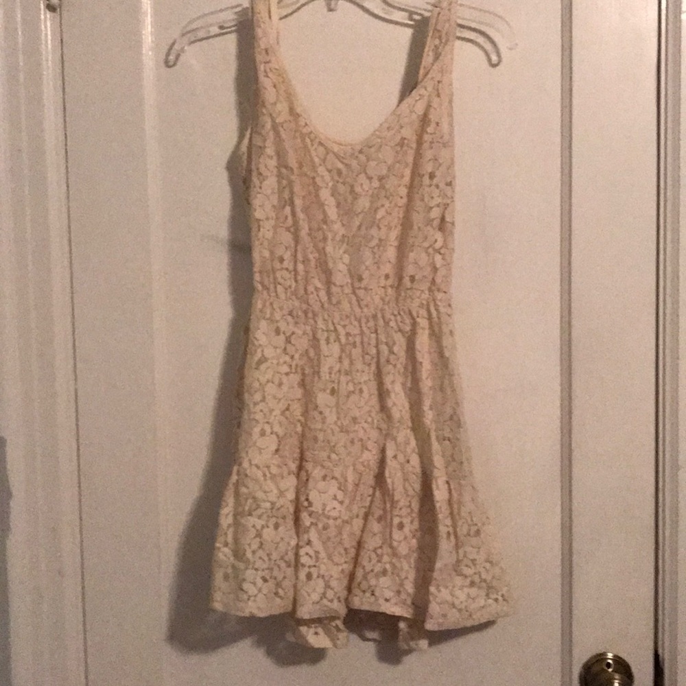A beige lace dress